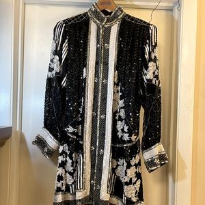 Formal white, black & silver sequin and beds top or jacket. Size 16.